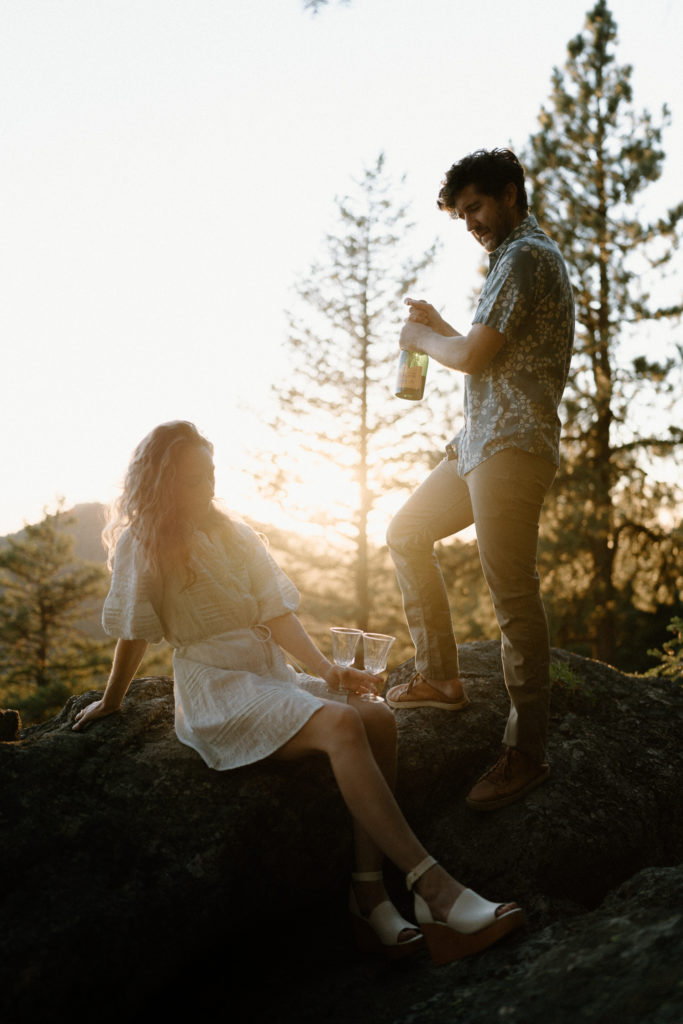 A couple shares and evening engagement session on Moscow Mountain in Idaho