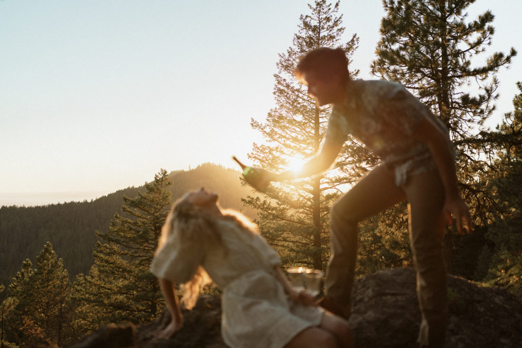 A couple shares and evening engagement session on Moscow Mountain in Idaho