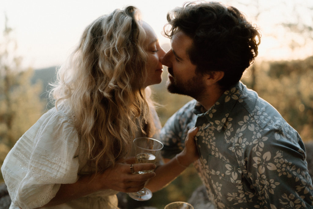 A couple shares and evening engagement session on Moscow Mountain in Idaho