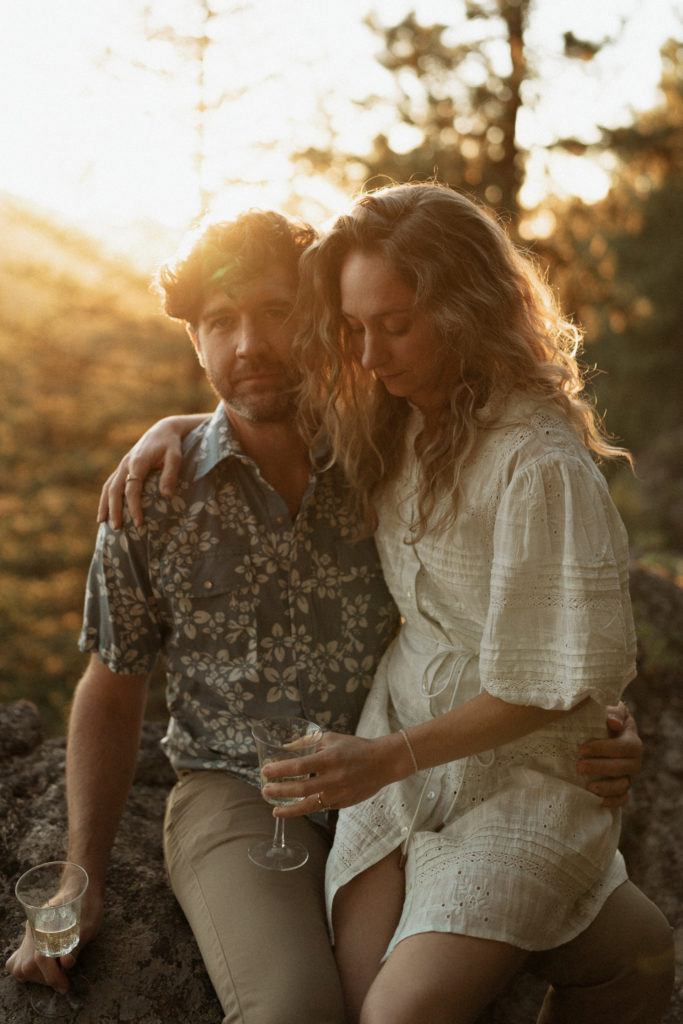 A couple shares and evening engagement session on Moscow Mountain in Idaho