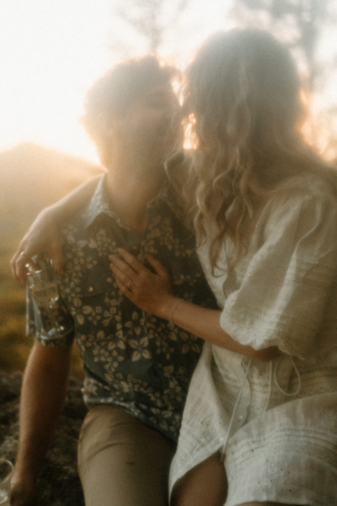 A couple shares and evening engagement session on Moscow Mountain in Idaho