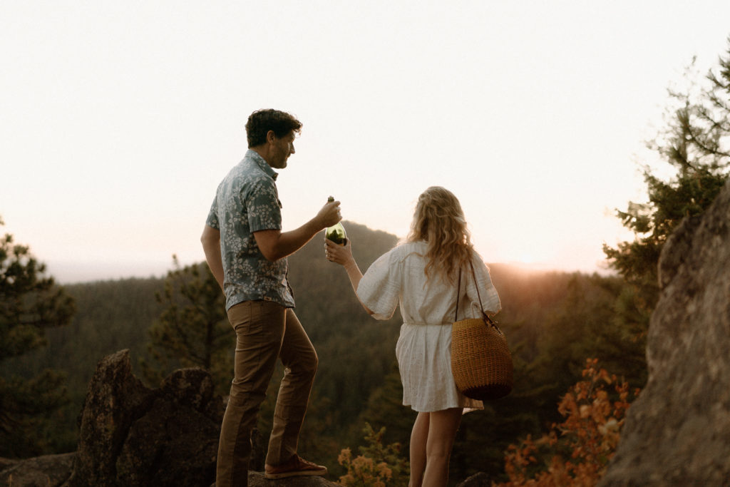 A couple shares and evening engagement session on Moscow Mountain