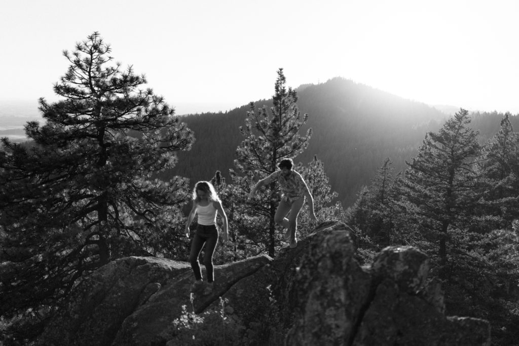 A couple shares and evening engagement session on Moscow Mountain in Idaho