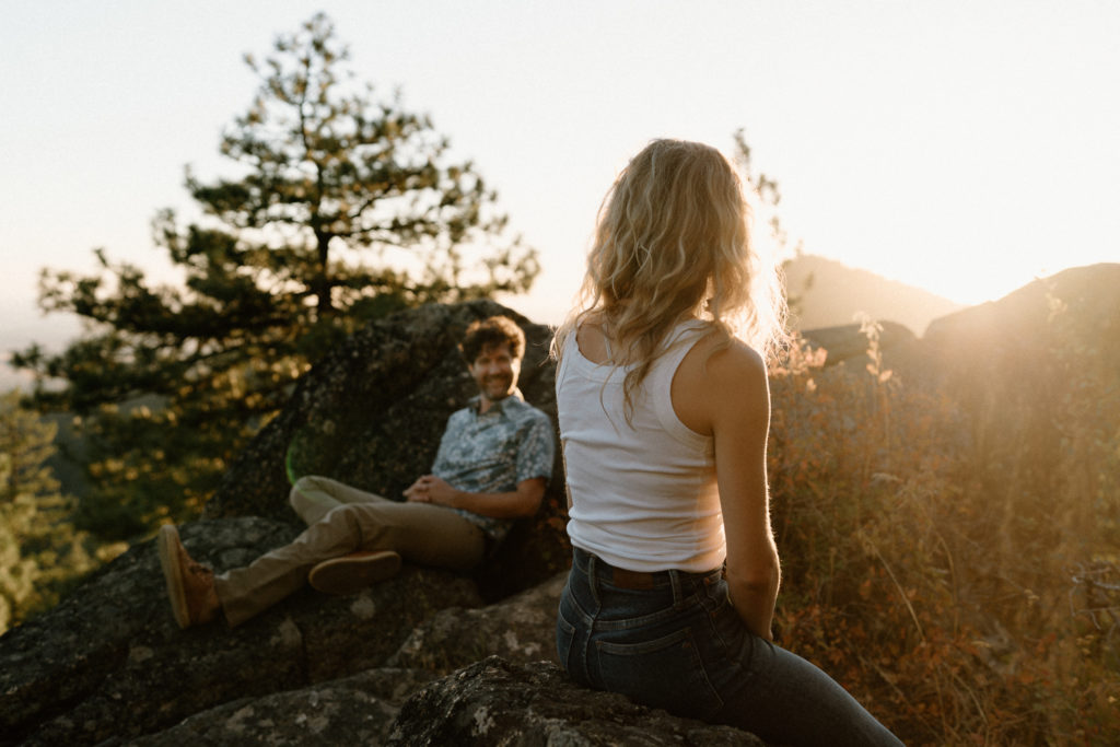 A couple shares and evening engagement session on Moscow Mountain in Idaho