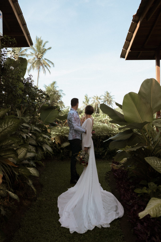 A couple has an international elopement in a beautiful bali villa