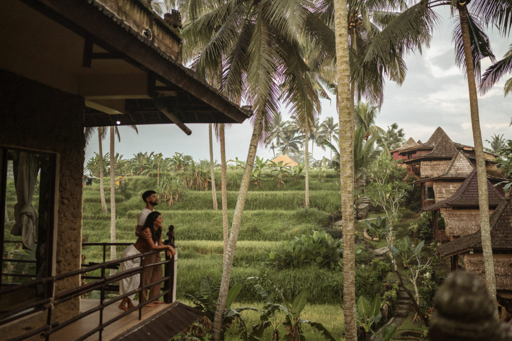 A sunrise engagement session in a bali villa