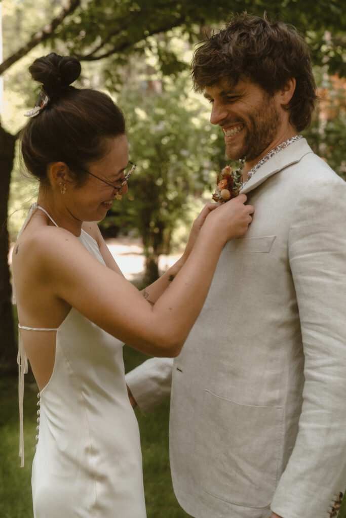 A moody Loloma Lodge wedding on the McKenzie River with forest vows and cozy cabin vibes